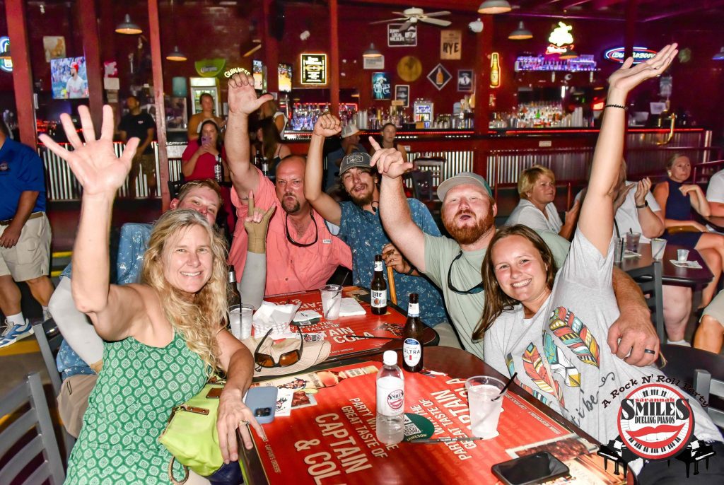Crowd with hands in the air at Savannah Smiles