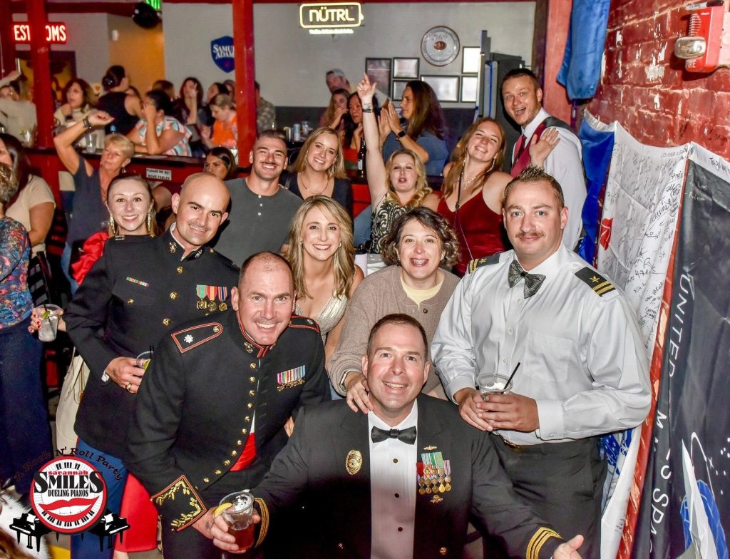 Service members celebrating at Savannah Smiles