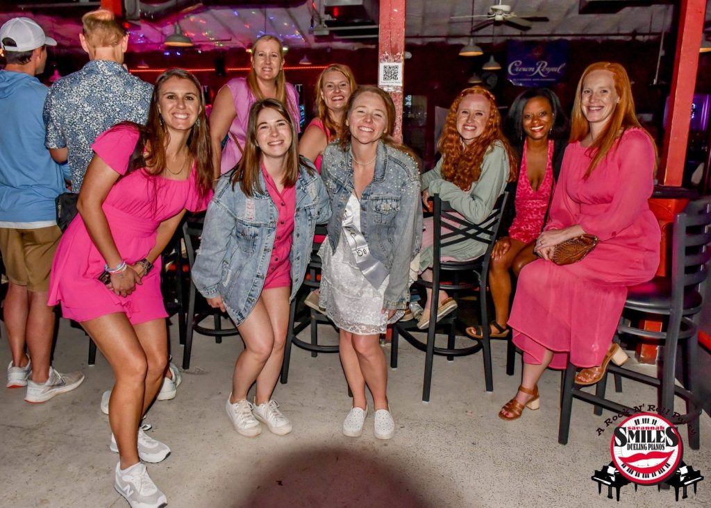Group in pink celebrating a bachelorette